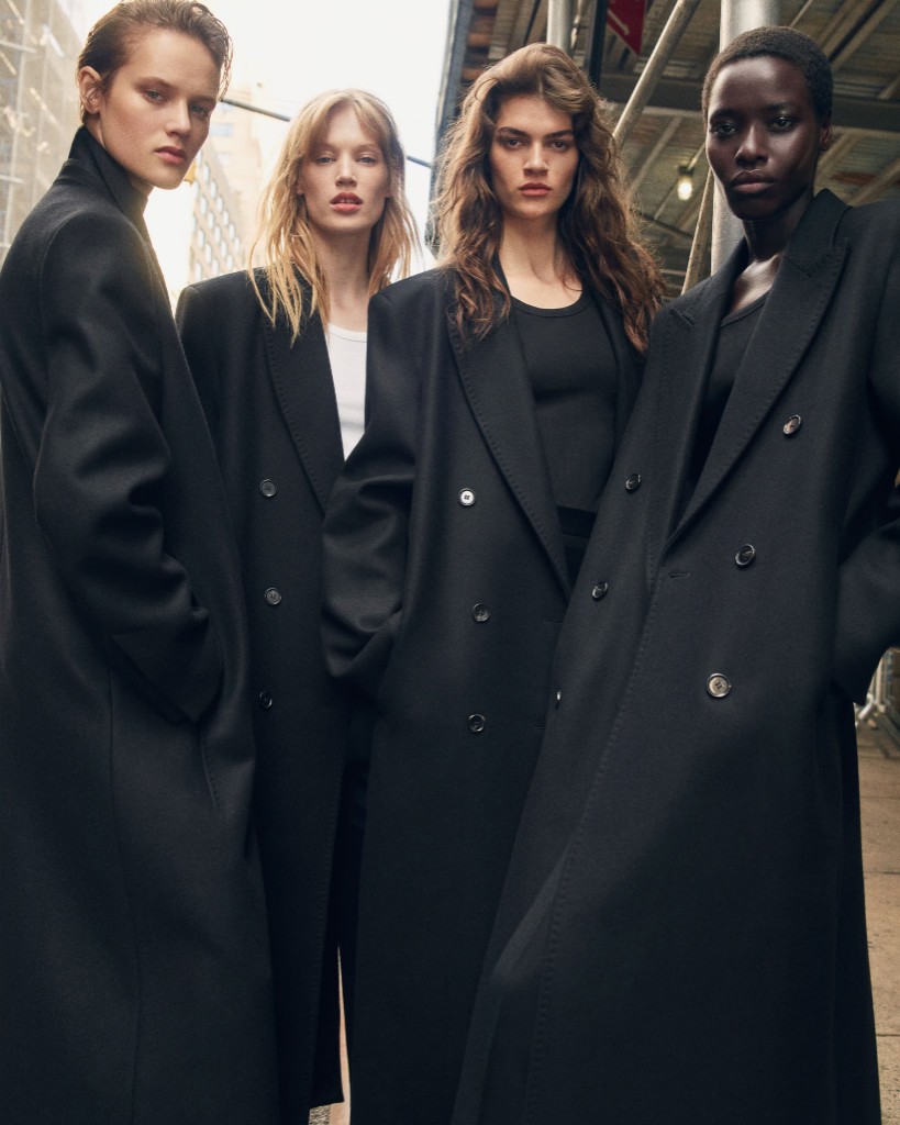 ÉDA editorial — models in black coats